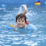 Boy in healthy swimming pool