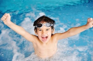 boy swimming in pool