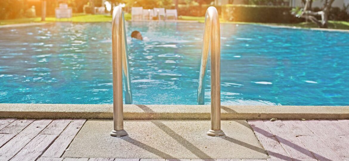 Swimming pool with stair and wooden deck
