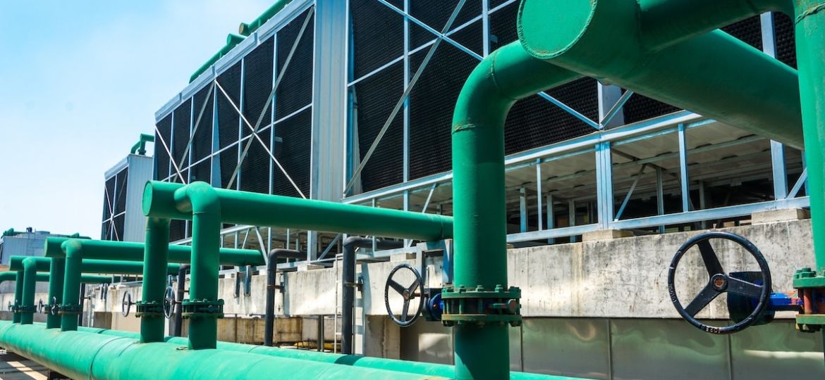 Sustainable AI data center cooling towers with low WUE and PUE environmental impact.