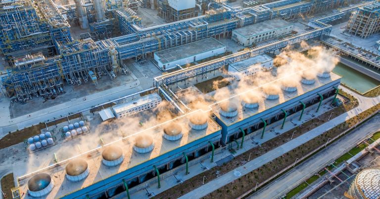 Aerial view of industrial exhaust fans at sunrise